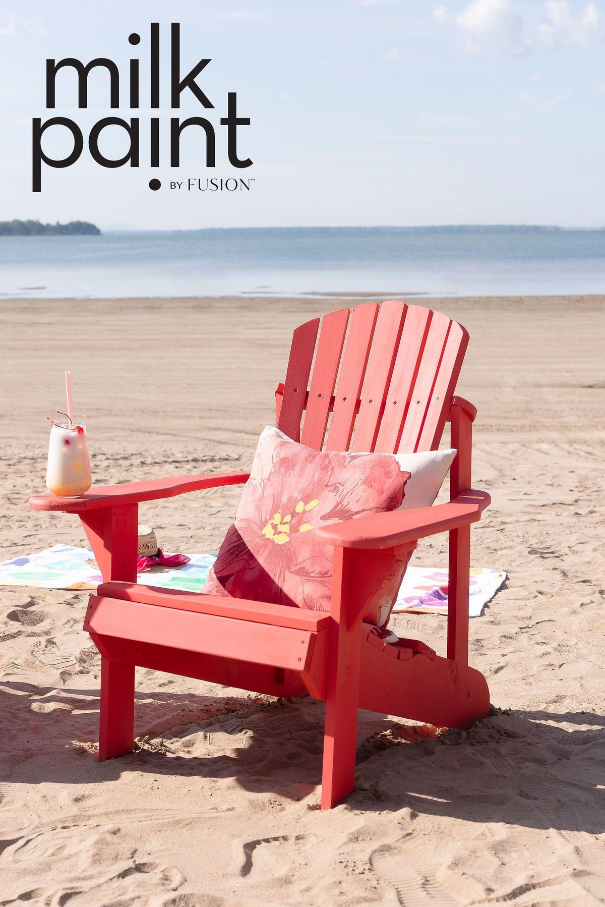 Red Adirondack chair painted with Fusion Mineral Paint Hawaiian Hibiscus Milk Paint on sand.