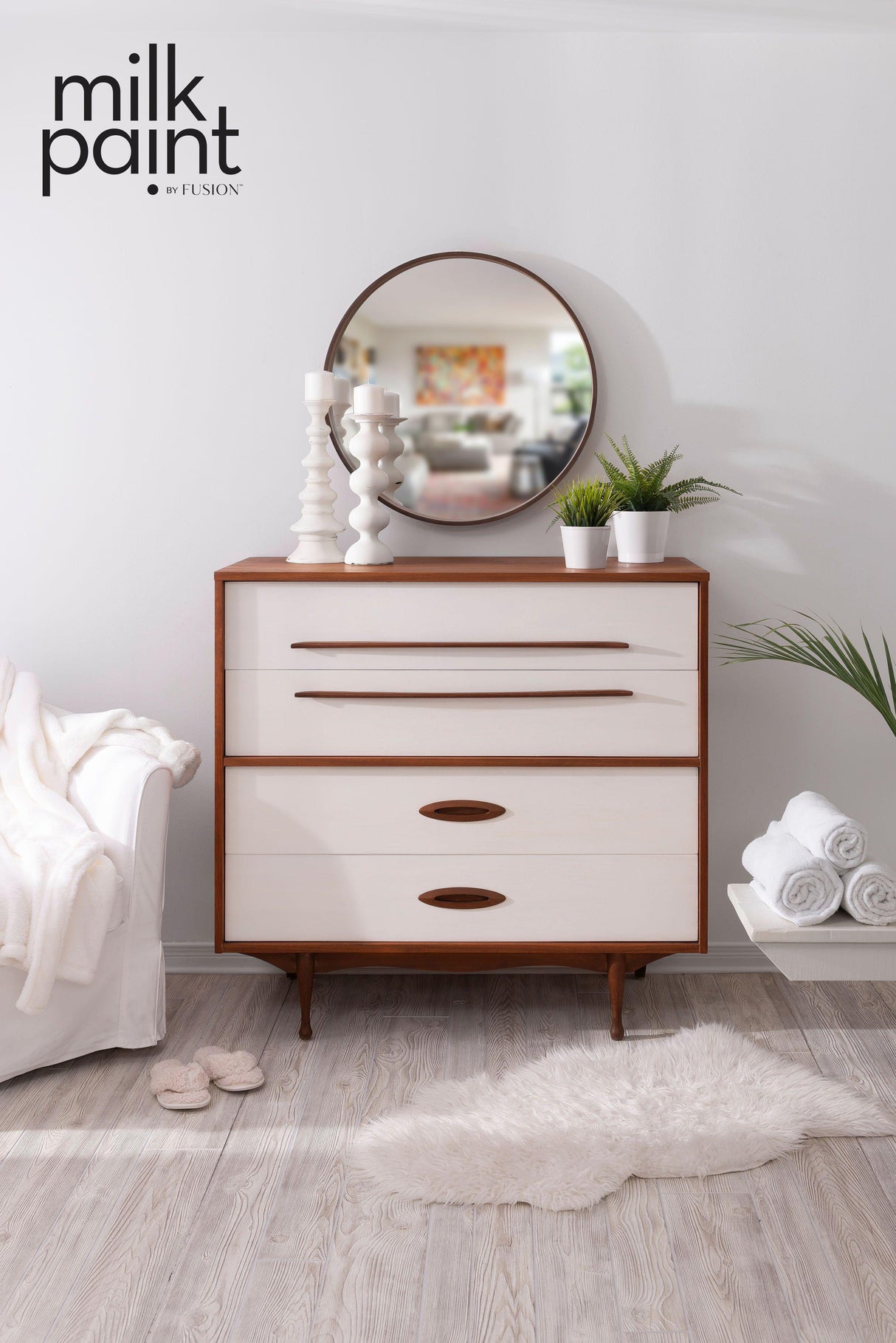Mid-century dresser painted in Fusion Mineral Paint’s Hotel Robe Milk Paint, shown with mirror, plants, and candles.