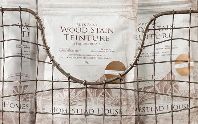 Fusion Mineral Paint Milk Paint Wood Stain bags placed behind a metal wire basket.