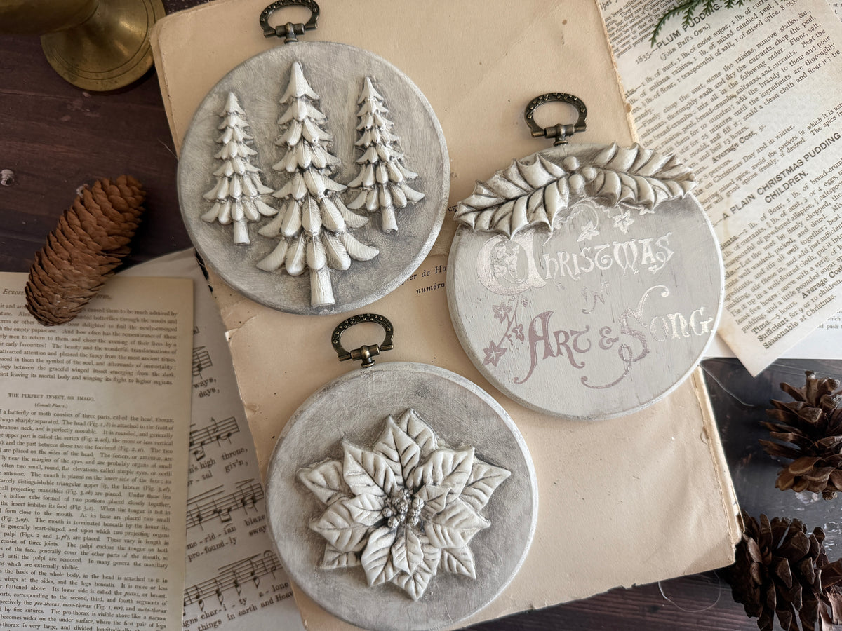 Set of 3 round clay ornaments with raised designs, made using I.O.D. Boughs of Holly (2026 Limited Release) mould.