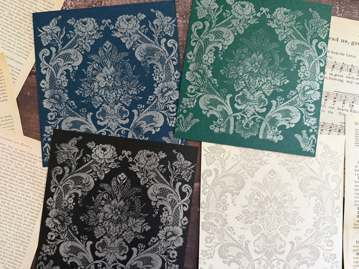 I.O.D. Metallic Ink Pads & Refills, 4 floral designs with gold shimmer on blue, green, black, and white backgrounds.
