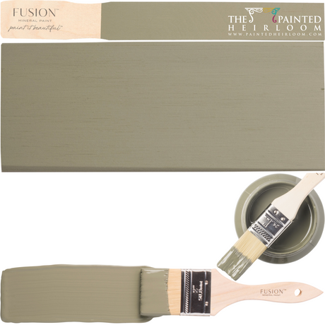 Acadia Pear Fusion Mineral Paint can with lid off and paintbrush resting nearby on a flat surface.