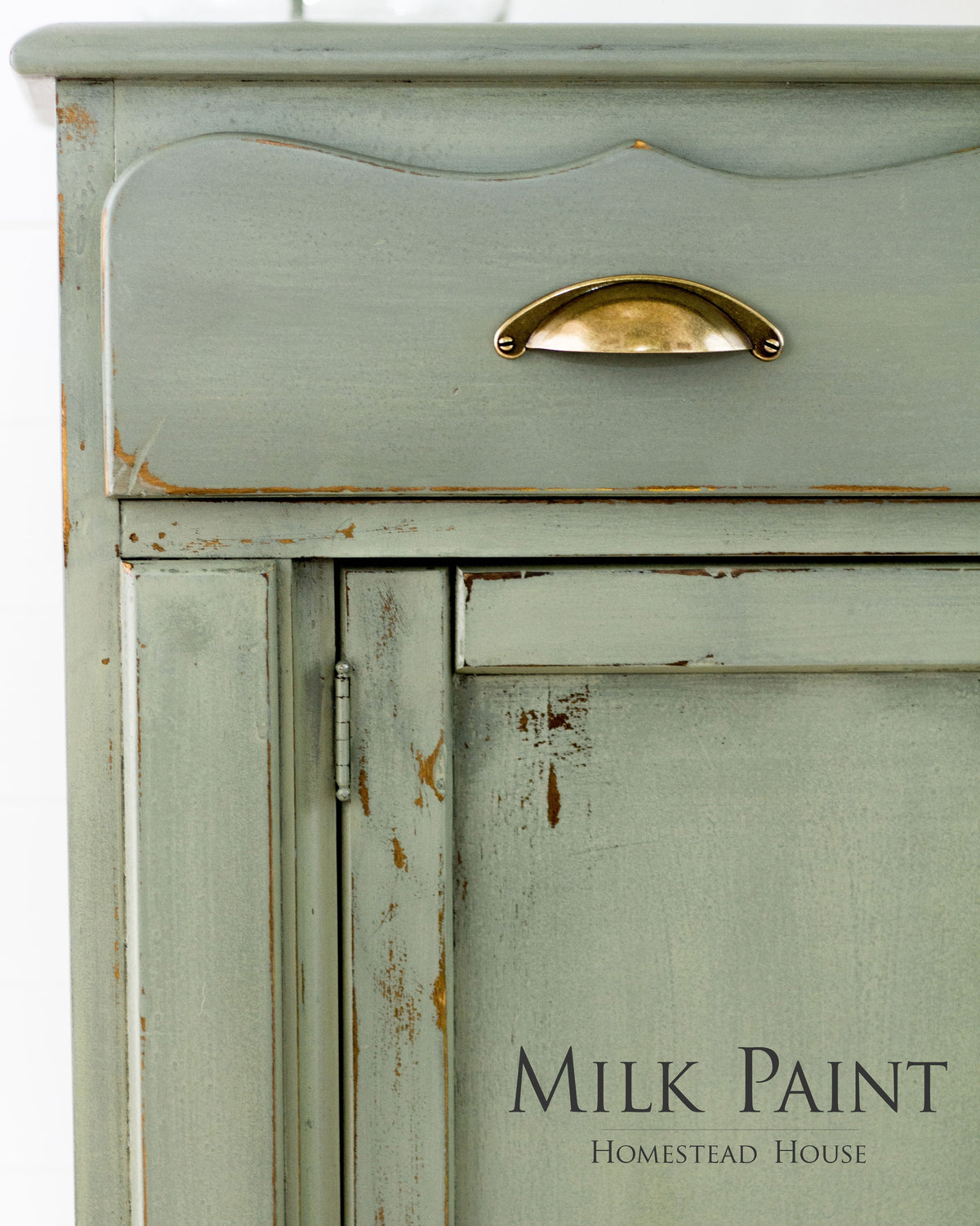 Distressed green cabinet with brass handle; Homestead House Acadia Pear Milk Paint shown bottom right.