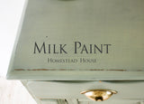 Green wooden dresser with brass handle, finished in Acadia Pear Milk Paint by Homestead House.