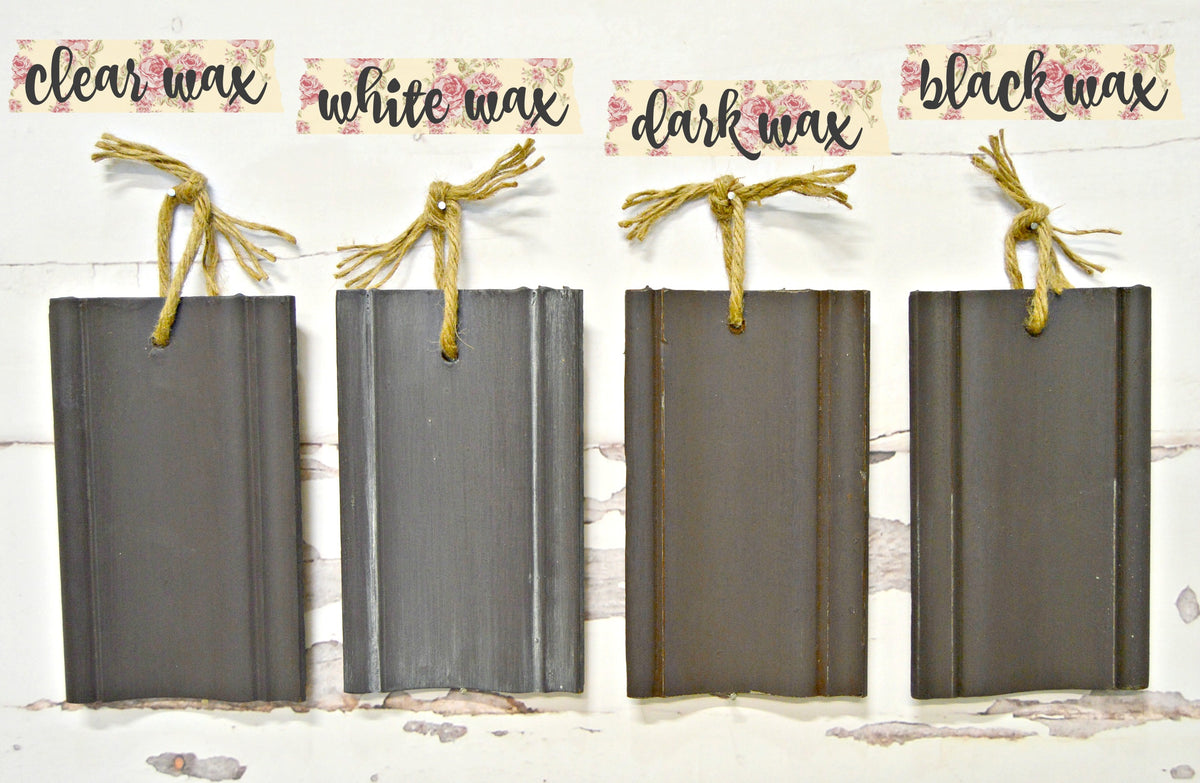 Four gray wood samples painted in Adelaide by Old Fashioned Milk Paint, waxed, each finished with a twine loop.