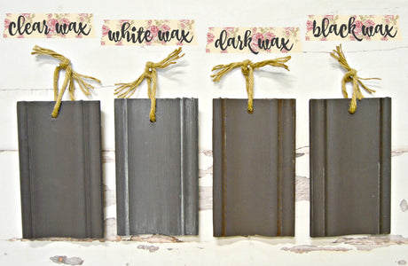 Four gray wood samples painted in Adelaide by Old Fashioned Milk Paint, waxed, each finished with a twine loop.