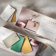 Fusion Mineral Paint Alchemy Briefcase Swatch Box Set with chalk-style swatches and display brochure included.