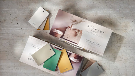 Alchemy Briefcase Swatch Box Sets by Fusion Mineral Paint featuring chalky shades on a light cracked surface.