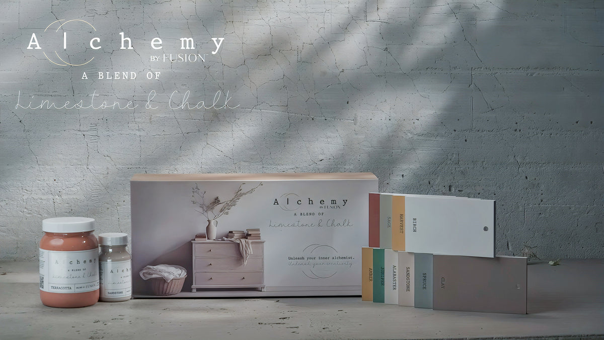 Fusion Mineral Paint Alchemy Briefcase Swatch Box Set with sample jars and color swatches on gray surface.