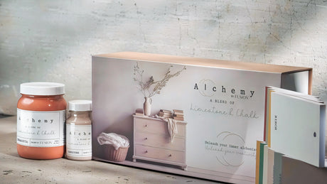 Fusion Mineral Paint Alchemy Briefcase Swatch Box Set with paint jars and cards on a white surface.