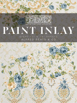 I.O.D. Alfred Peats and Co. Paint Inlay packaging with blue and cream floral motifs and overlaid product details.