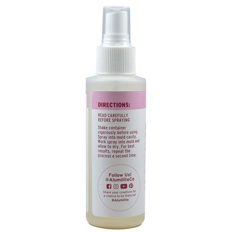 White Notions spray bottle with pink Alumilite Mold Release & Conditioner label, info text visible on the back.