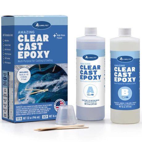 Box with two bottles of Notions Amazing Clear Cast Epoxy by Alumilite, plus stir sticks and measuring cups.