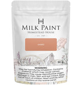 Homestead House Amber Milk Paint 50g pouch with floral design and warning text at the bottom.