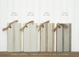 Four wood samples labeled and tied with rope, finished in Old Fashioned Milk Paint’s Antique Ironstone.