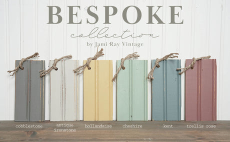 Six wooden boards in Antique Ironstone by Old Fashioned Milk Paint, standing upright with rope on top.