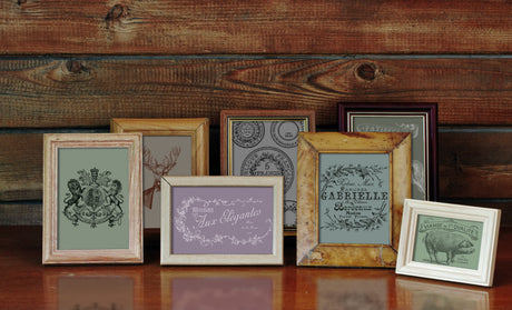IOD Antiquities Stamp displayed with vintage-style frames for scrapbooking or silicone stamp art projects.