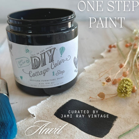 Anvil DIY Cottage Color by DIY Paint Co. jar with brush, dried flowers, and paint swatch nearby.