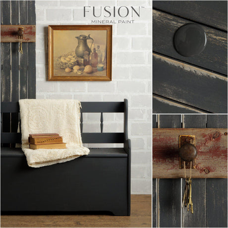 Black bench painted in Ash by Fusion Mineral Paint, dark charcoal grey, cream knit blanket draped over seat.