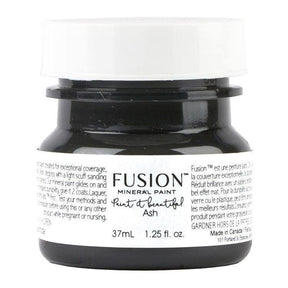 Fusion Mineral Paint 37mL jar, Ash color (dark charcoal grey) with white cap.