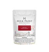 50g Barn Red Milk Paint by Homestead House with warning label and barn plus wagon wheel illustration on packaging.