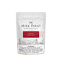 50g Barn Red Milk Paint by Homestead House with warning label and barn plus wagon wheel illustration on packaging.