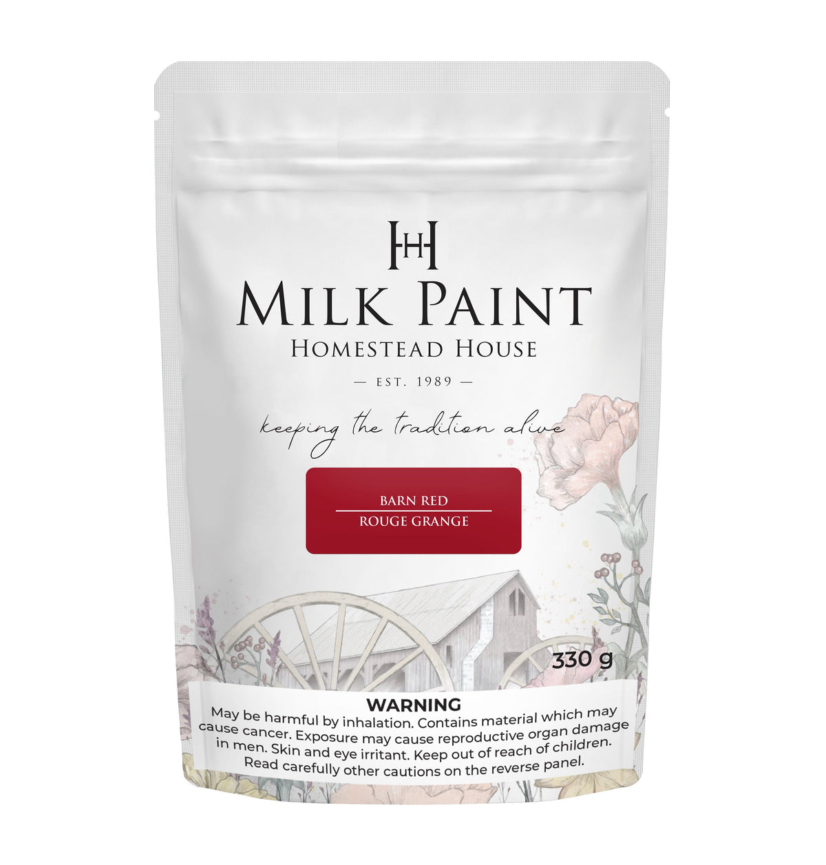 Homestead House Barn Red Milk Paint 330g bag with floral and wagon wheel design, safety info at the bottom.