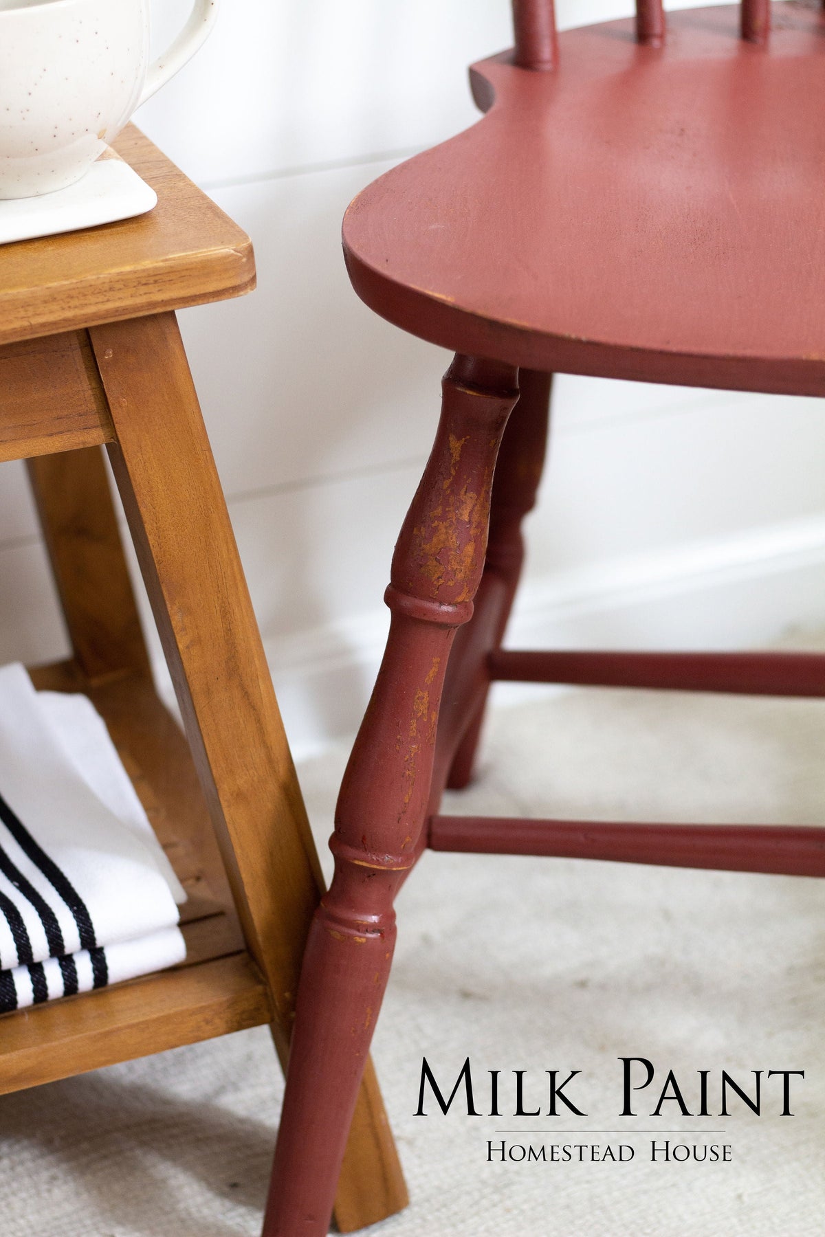 Homestead House Barn Red Milk Paint with a rustic, matte finish for vintage-inspired decor projects.