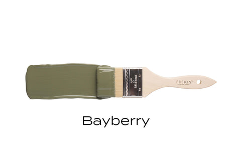 Paintbrush with Bayberry Fusion Mineral Paint in olive green, Fusion Mineral Paint branding on handle.