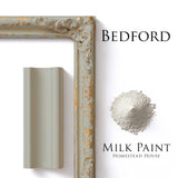 Frame, paint sample, and Bedford Milk Paint by Homestead House shown together.