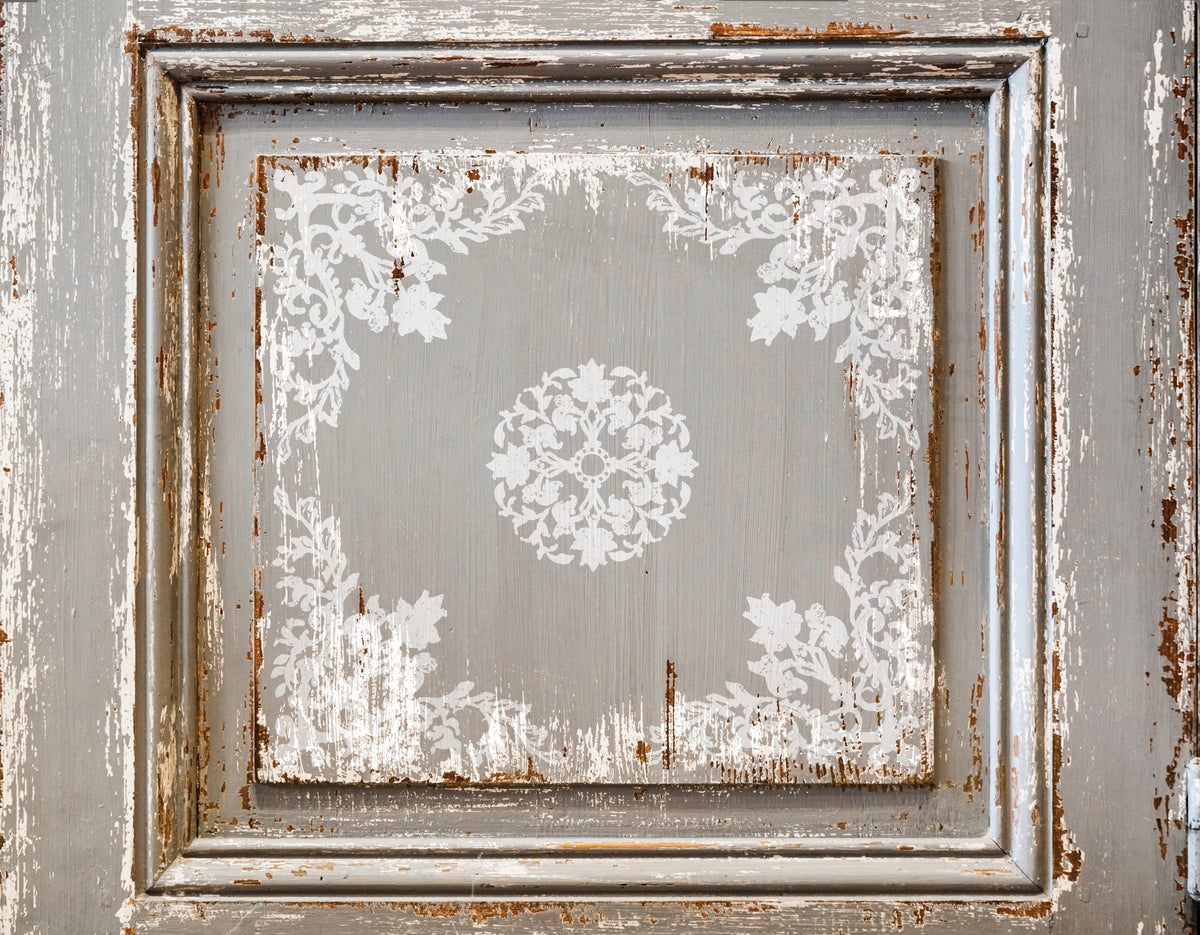 Distressed wood featuring faded white florals created with I.O.D. Bella Stamp (Retired) by Iron Orchid Designs.
