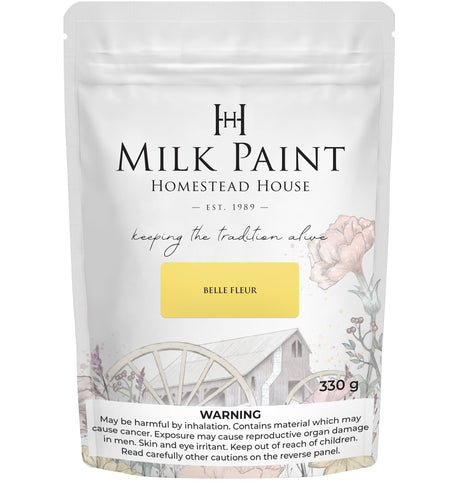 330g Belle Fleur Milk Paint by Homestead House in a bag featuring floral and wagon wheel designs on the front.