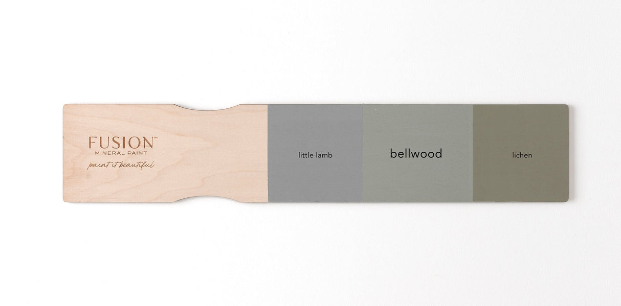 Wooden paddle showing three Fusion Mineral Paint swatches: Little Lamb, Bellwood, and Lichen.