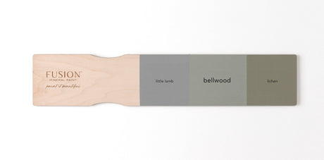 Wooden paddle showing three Fusion Mineral Paint swatches: Little Lamb, Bellwood, and Lichen.