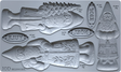 The Belsnickel Mould (2026 Limited Release) by IOD with Santa, pine tree, and festive holiday shapes.