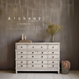 Dresser painted in Fusion Mineral Paint’s Birch Alchemy, topped with vases and dried flowers.