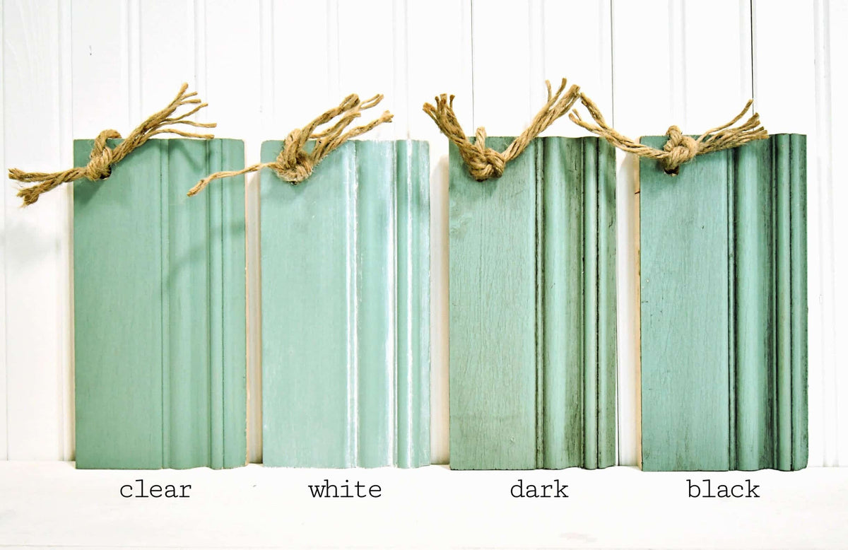 Four Birdie trim samples painted with Old Fashioned Milk Paint, each bundled and tied with twine at the top.