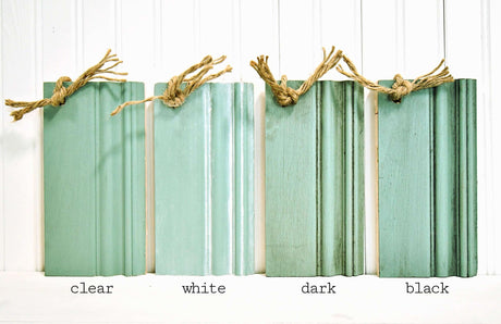 Four Birdie trim samples painted with Old Fashioned Milk Paint, each bundled and tied with twine at the top.