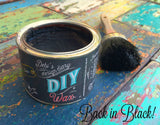 DIY Paint Co. Open Black DIY Wax with brush on wood surface; text reads “Back in Black!”.