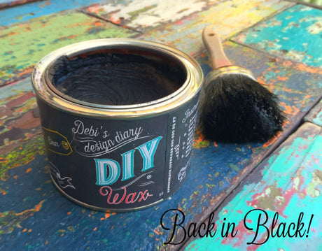 DIY Paint Co. Open Black DIY Wax with brush on wood surface; text reads “Back in Black!”.