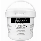 40oz Fusion Mineral Paint Black Furniture Wax tub with handle, labeled for furniture care and caution.