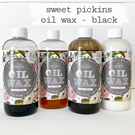 Four bottles of Sweet Pickins Old Fashioned Milk Paint Black Oil Wax furniture sealer.
