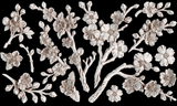I.O.D. Blossom Mould cream branch designs on bold black background, inspired by Iron Orchid Designs.