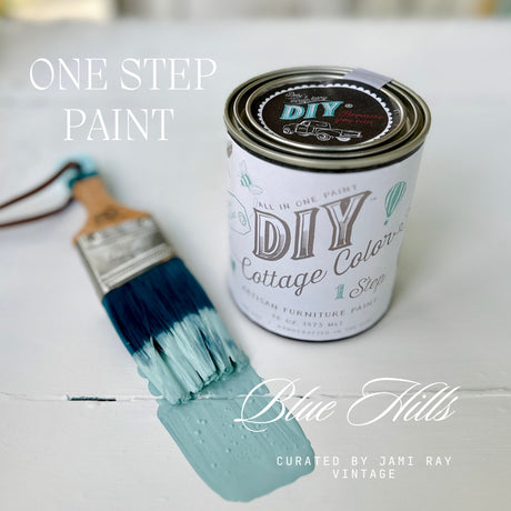 Blue Hills DIY Cottage Color paint can with brush, both featuring blue water-based paint on a white surface.