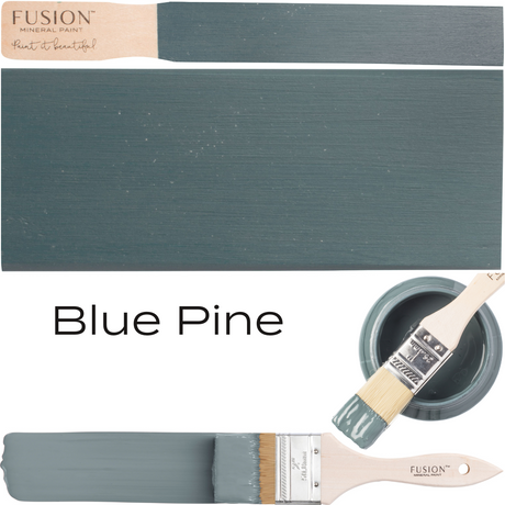 Blue Pine Fusion Mineral Paint swatch, matte finish, beside paint brushes and an open Fusion Mineral Paint jar.