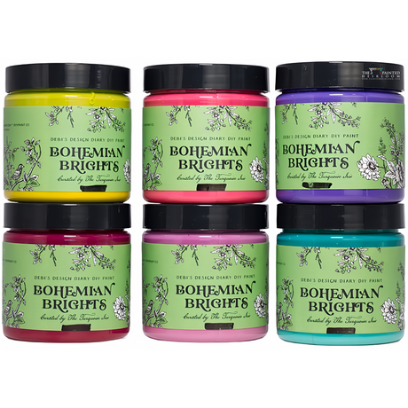Six Bohemian Brights by DIY Paint Co. jars arranged in two rows on a white surface.