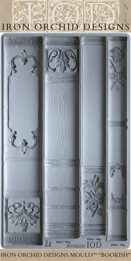I.O.D. Bookish Mould in gray silicone with four vintage book spine designs for Iron Orchid Designs projects.
