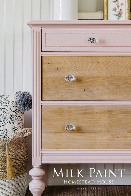 Pink-frame dresser in Homestead House Bouquet Milk Paint with wood drawers and glass knobs.