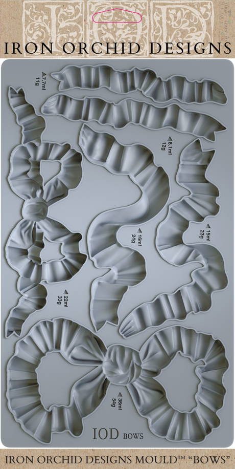 I.O.D. Bows Mould by Iron Orchid Designs, silicone tray with 6 bow-shaped cavities for crafting.