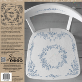 White chair with blue Brambles & Berries Stamp florals by I.O.D.; decorating tips visible on the left side.